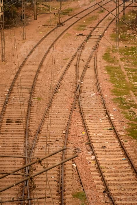 View of train Railway Tracks from the middle during daytime at