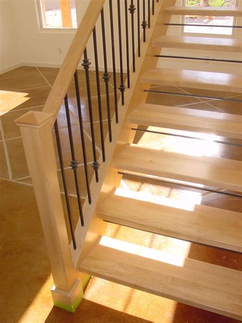 Interior stair banister gallery. Maple wood stairs and railings. Open
