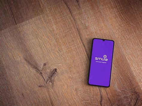 Launch Screen Of Smule App With Logo On Black Mobile Display Photo ...
