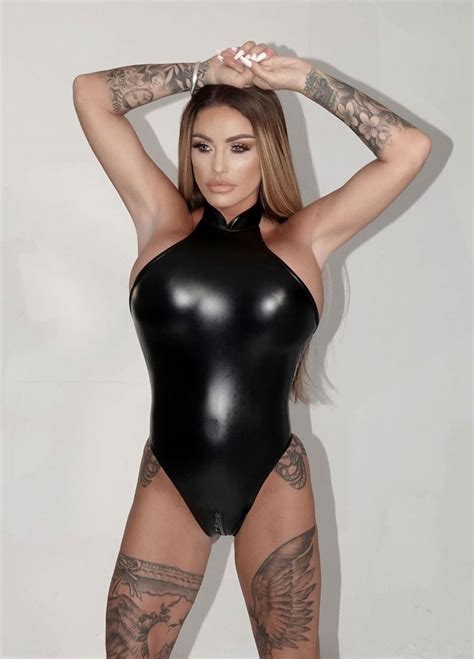 KATIE PRICE in a Black Tight PVC Easter Outfit at a Photoshoot 04/11