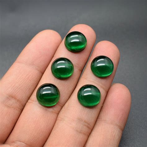 emerald  cabochon smooth polished surface  rich green emerald