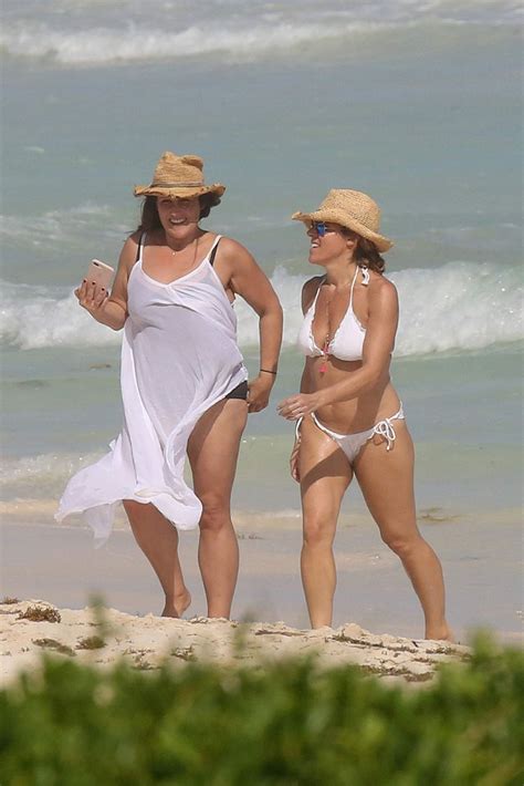 RICKI LAKE in Swimsuit with a Friend on the Beach in Cancun 12/27/2016
