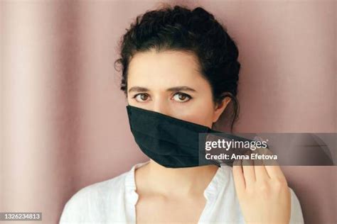 Taking Your Mask Off Photos and Premium High Res Pictures - Getty Images