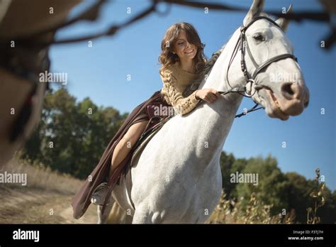beautiful girl riding  horse stock photo alamy