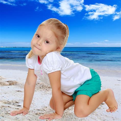The girl is on all fours stock image. Image of person - 76918917