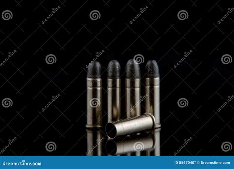Blank Bullet Lays on the Ground in Black Stock Image - Image of dead ...