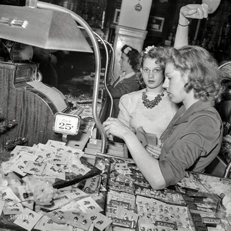 December 1941. Washington, D.C. "Christmas shopping. Salesgirls at Wool