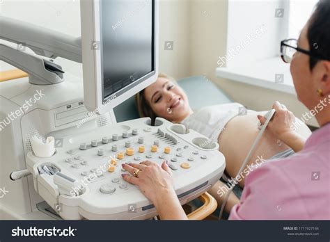 Pregnant Girl Gets Ultrasound Her Abdomen Stock Photo 1711927144 | Shutterstock