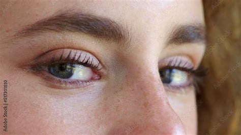 Closeup portrait of a young woman thinking about a nostalgic memory ...