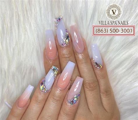 There's something about having long, painted nails that makes beauty ...