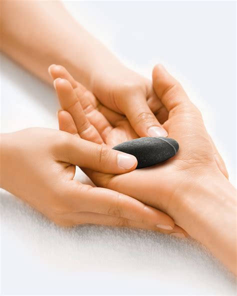 Why Your Next Massage SHOULD Be A Hand And Stone Massage Image 1
