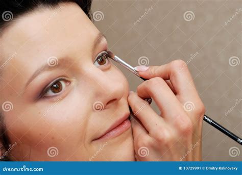 Make-up. Eye shadow stock image. Image of hands, cosmetic - 10729991