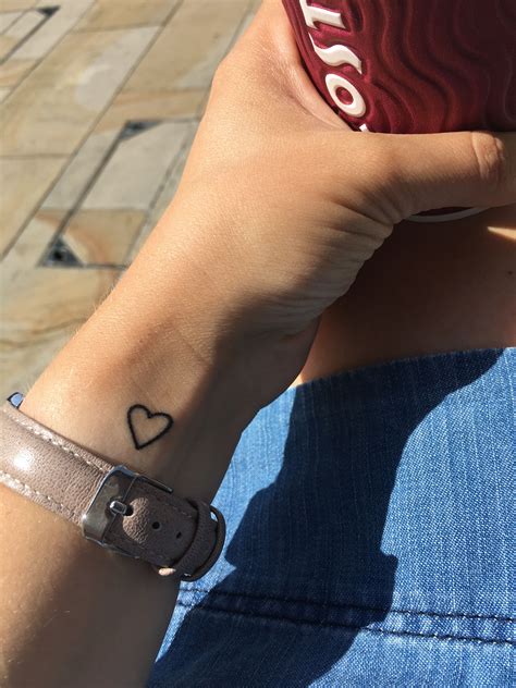 Discover the best mini heart tattoo on wrist ideas for your next ink