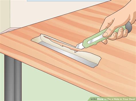 how to fix a hole in a desk