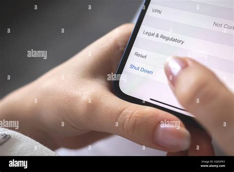 Person shut down the smartphone, mobile phone turn off concept photo ...