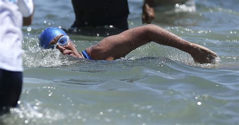 Citing sex abuse cases, swimmers protest Hall of Fame induction