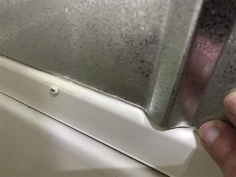 Installing tin roofing on the shower walls – Artofit