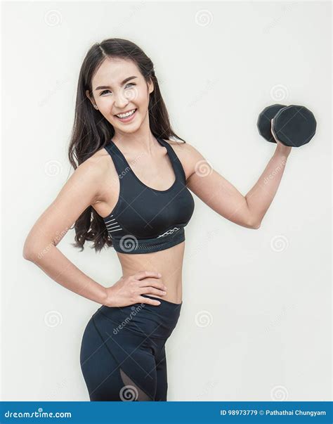 Man Showing Biceps Hands Up. Sportsman Showing Muscles. ABS, Biceps