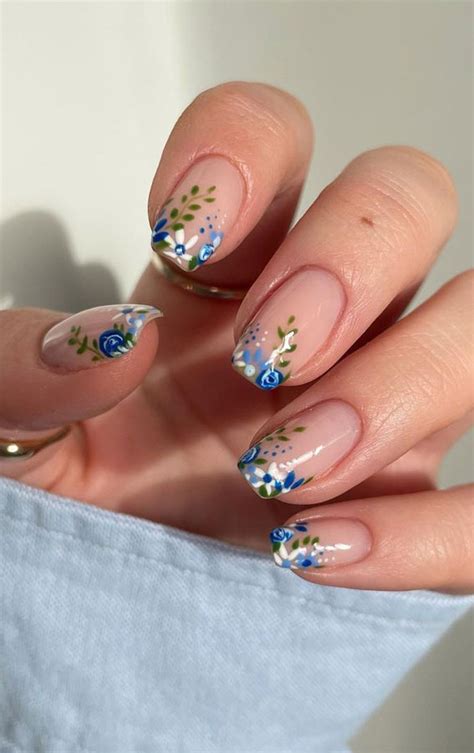 45 Trendy Spring Nails That'll See Everywhere : Blue Floral Tip Nails