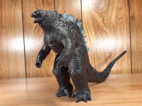 rubber godzilla    actual godzilla finger puppets
