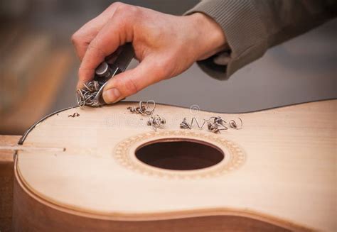 Serious Professional Guitar-maker Working with Unfinished Guitar at Workshop Stock Image - Image ...