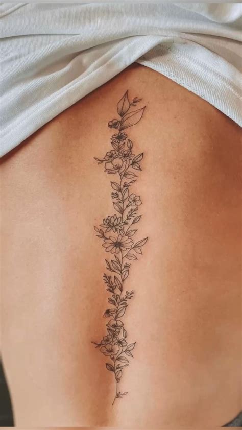 Spine tattoo spine tattoo ideas flower spine tattoo flower tattoos tattoo ideas tattoos petite ...