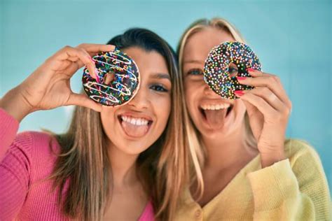 18,200+ People Eating Donuts Stock Photos, Pictures & Royalty-Free ...