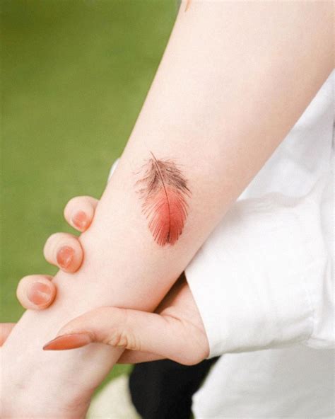 Simple And Symbolic, 24 Feather Tattoo Ideas To Inspire You