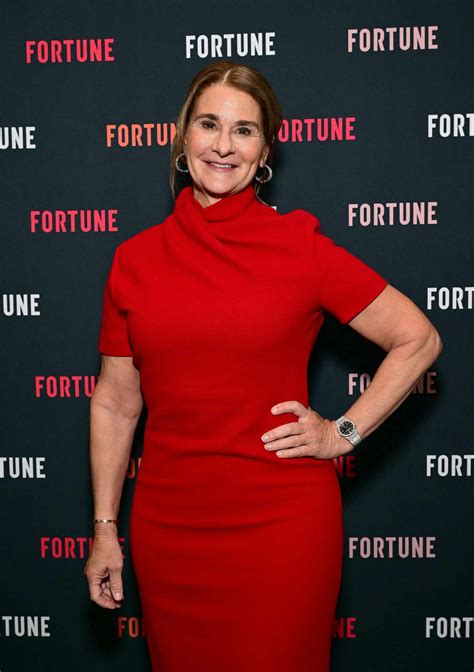 Melinda French Gates Holds Hands with Philip Vaughn