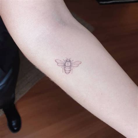 Fine line bee tattoo on the inner forearm. | Bee tattoo, Fine line ...