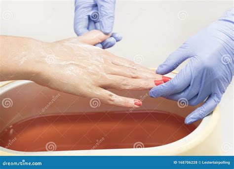 Process Paraffin Treatment of Female Hands Stock Photo - Image of ...