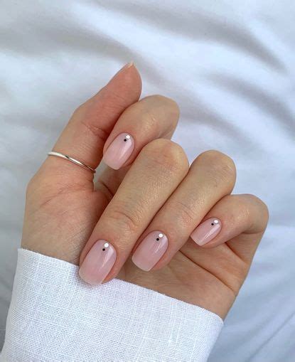 Hands down, these are 11 of the best clear nail designs for a minimalist manicure. | Who What Wear