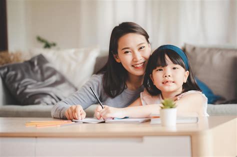 Happy Asian family mother and daughter studying together 2140265 Stock