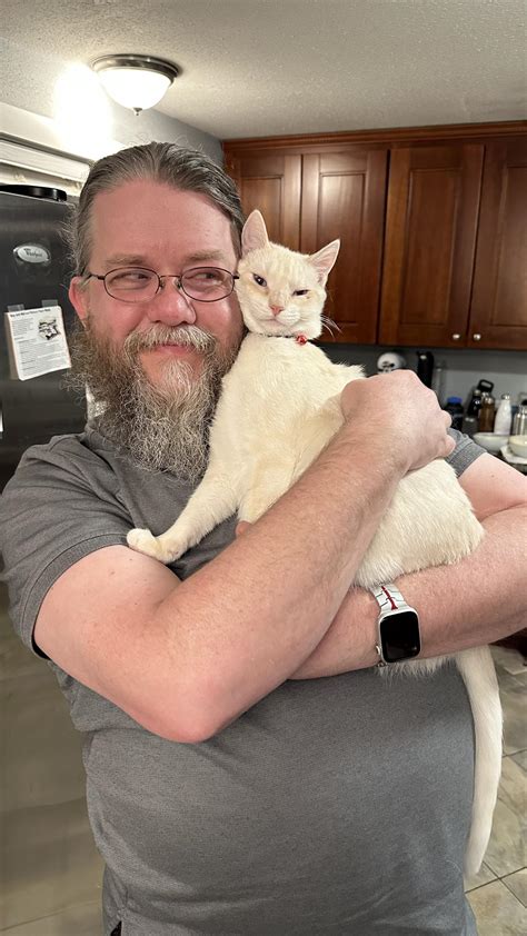[OC] My das didn’t want the cat. My dad and the cat: : r/MadeMeSmile