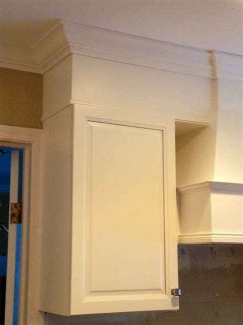 Idea if we have to keep the soffit. I love the trim added to cabinet to