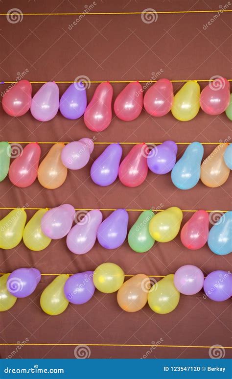 Balloon Shooting Game with Balloons on a String Stock Photo - Image of ...