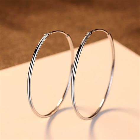 Сребърни обеци с уникален дизайн – Silenti Jewelry