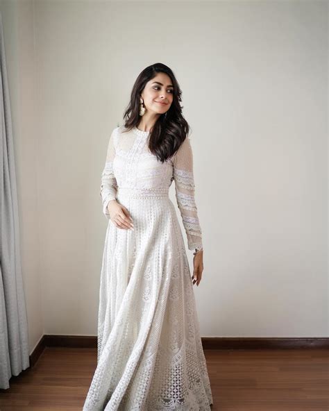 Mrunal Thakur looks divine goddess in white embellished Anarkali suit