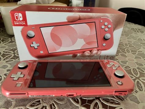 Nintendo switch lite (coral), Video Gaming, Video Game Consoles ...