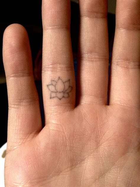 small simple lotus flower finger tattoo flower finger tattoos finger