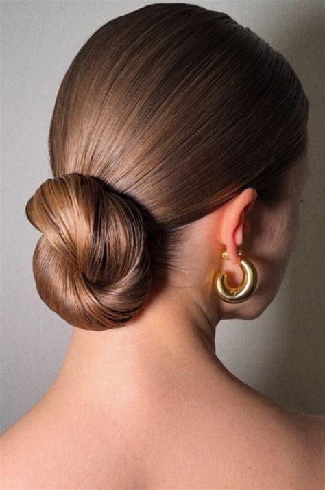 sleek  bun updo timeless elegance  modern polish