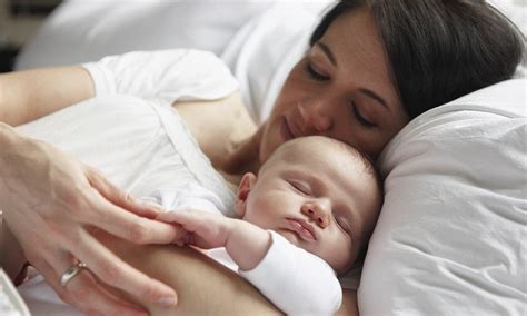 Newborn baby boy suffocates to death after mother ROLLS OVER him in her ...