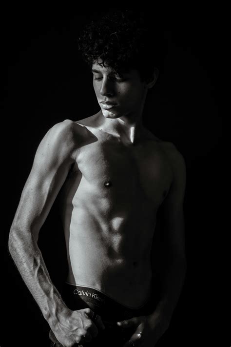 Men in Underwear Posing on Black Background · Free Stock Photo