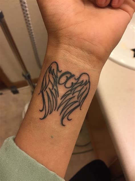 angel wings tattoo men 7