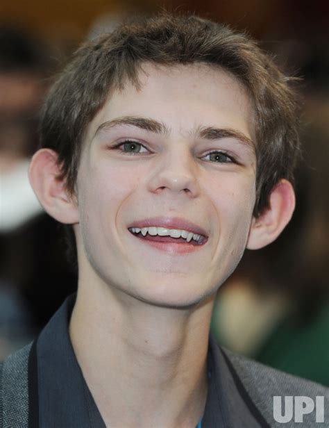 Photo: Robbie Kay attends "Pirates of the Caribbean: on stranger tides ...