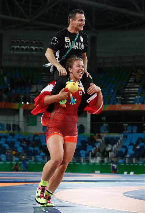 Here Is Adorable Badass Erica Wiebe Carrying Her Coach After She Won Gold