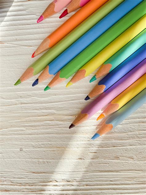 Multi Colored Pencils over White Background · Free Stock Photo