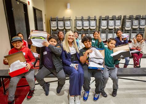 Tai Collins and A Chance for Children Give Shoes To 491 Kids in Los