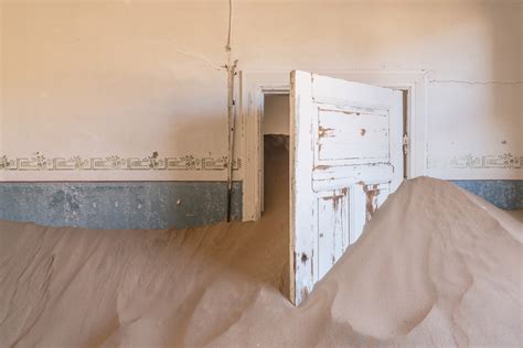 Learn the history of Kolmanskop, a Namibian ghost town covered in sand