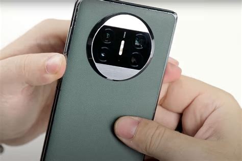 Смартфон Huawei за 150 тыс. руб. протестировали на прочность стиральной ...